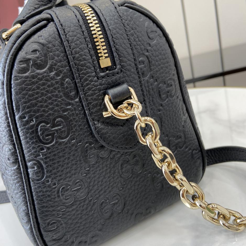 Borsa piccola serie Gucci GG Emblem